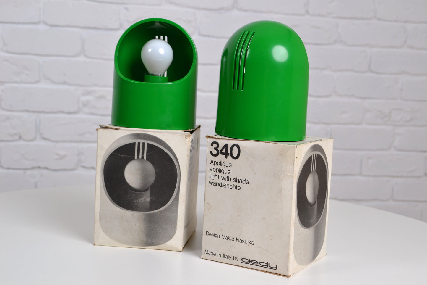 Pair Italian space aged green wall lights / boxed by Makio Hasuike for Gedy