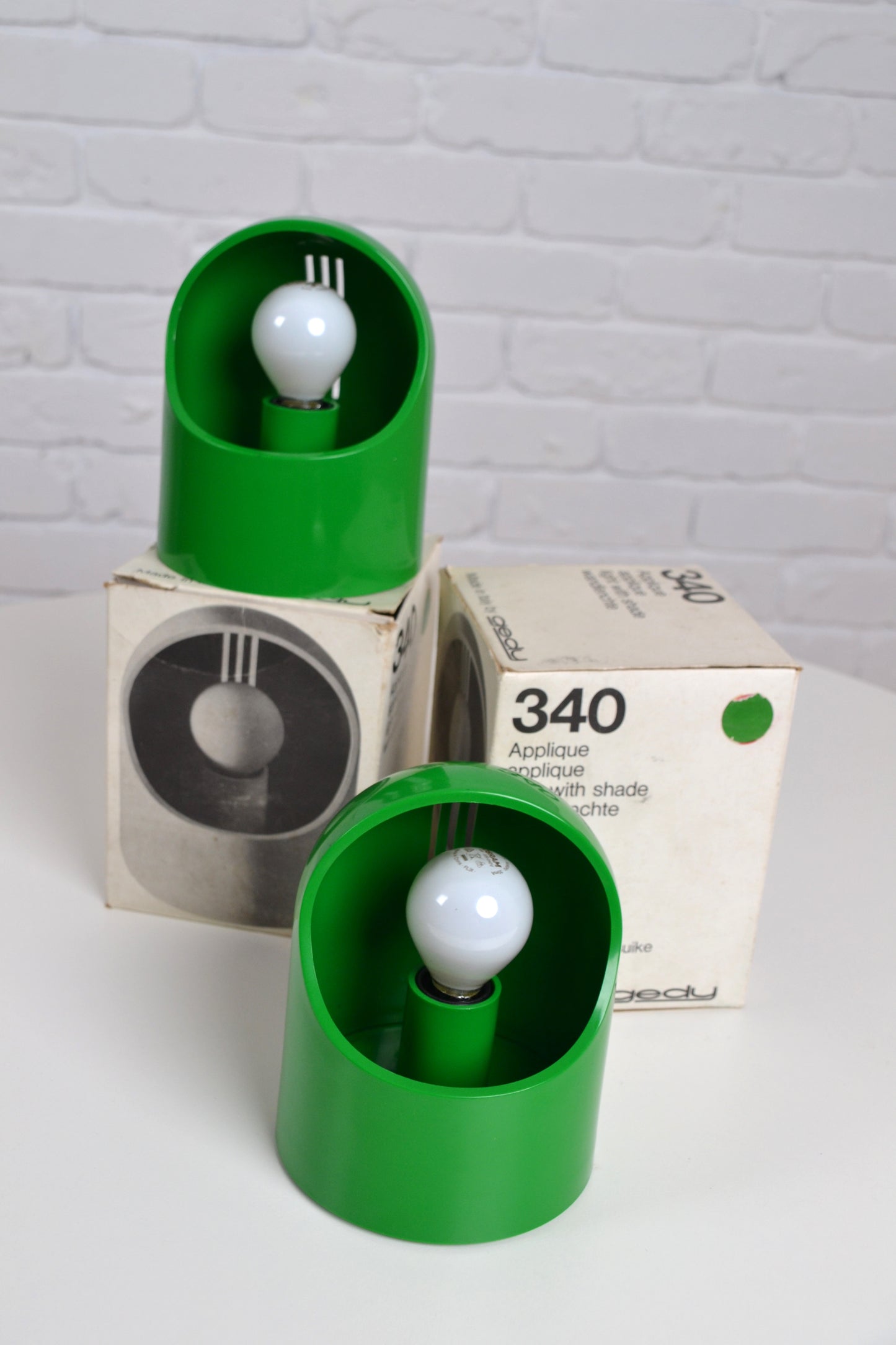 Pair Italian space aged green wall lights / boxed by Makio Hasuike for Gedy