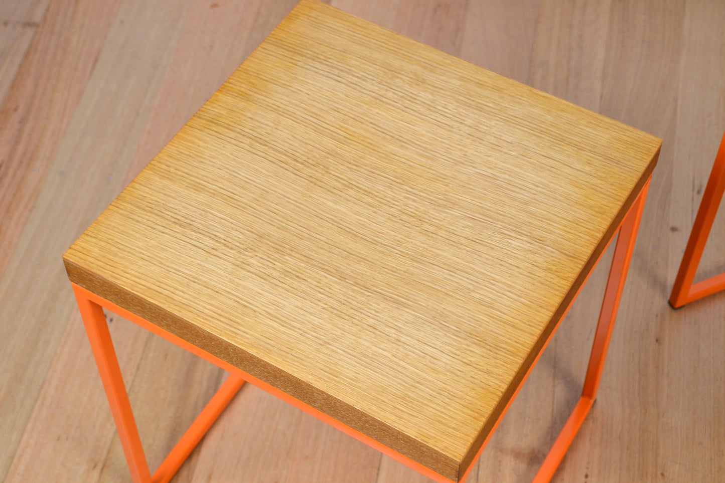Modern designer stool /side table in natural Oak orange frame
