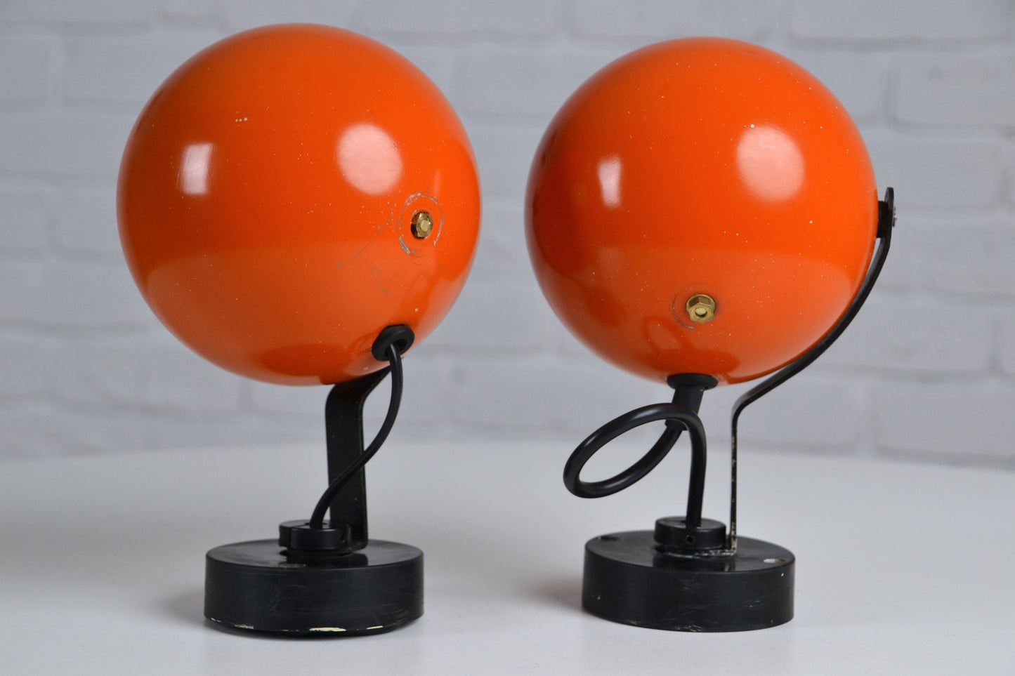Pair eyeball space age wall sconces / lights in orange by Erco - Germany