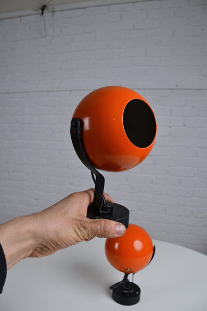 Pair eyeball space age wall sconces / lights in orange by Erco - Germany