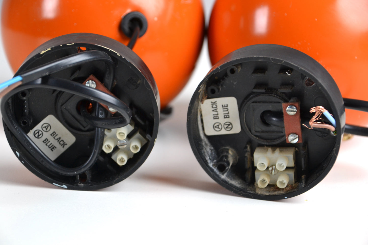 Pair eyeball space age wall sconces / lights in orange by Erco - Germany