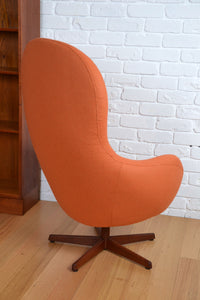 Danish vintage swivel egg armchair / orange wool - restored Warwick wool