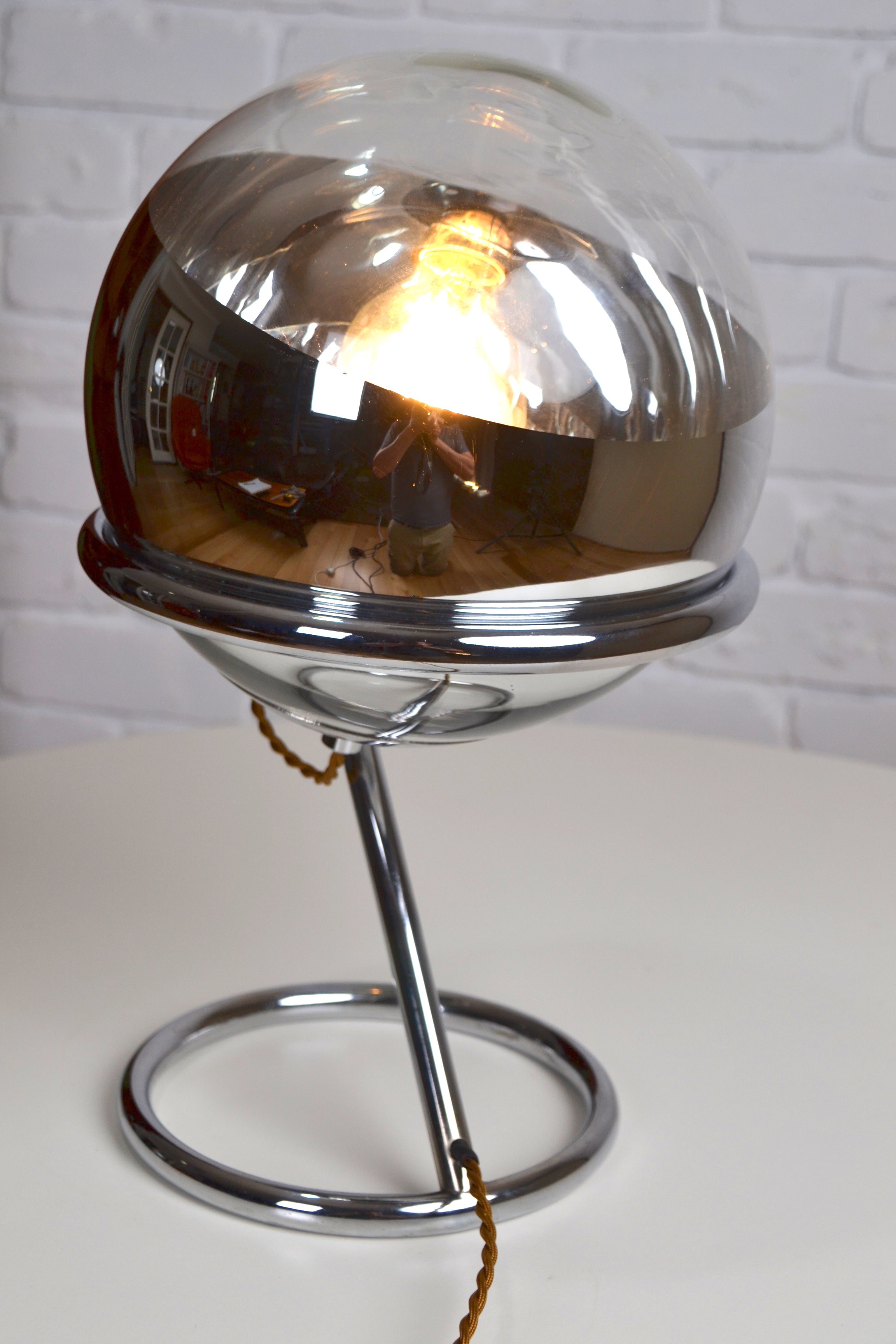 Vintage 'Orb mirror' eyeball lamp on chrome plinth