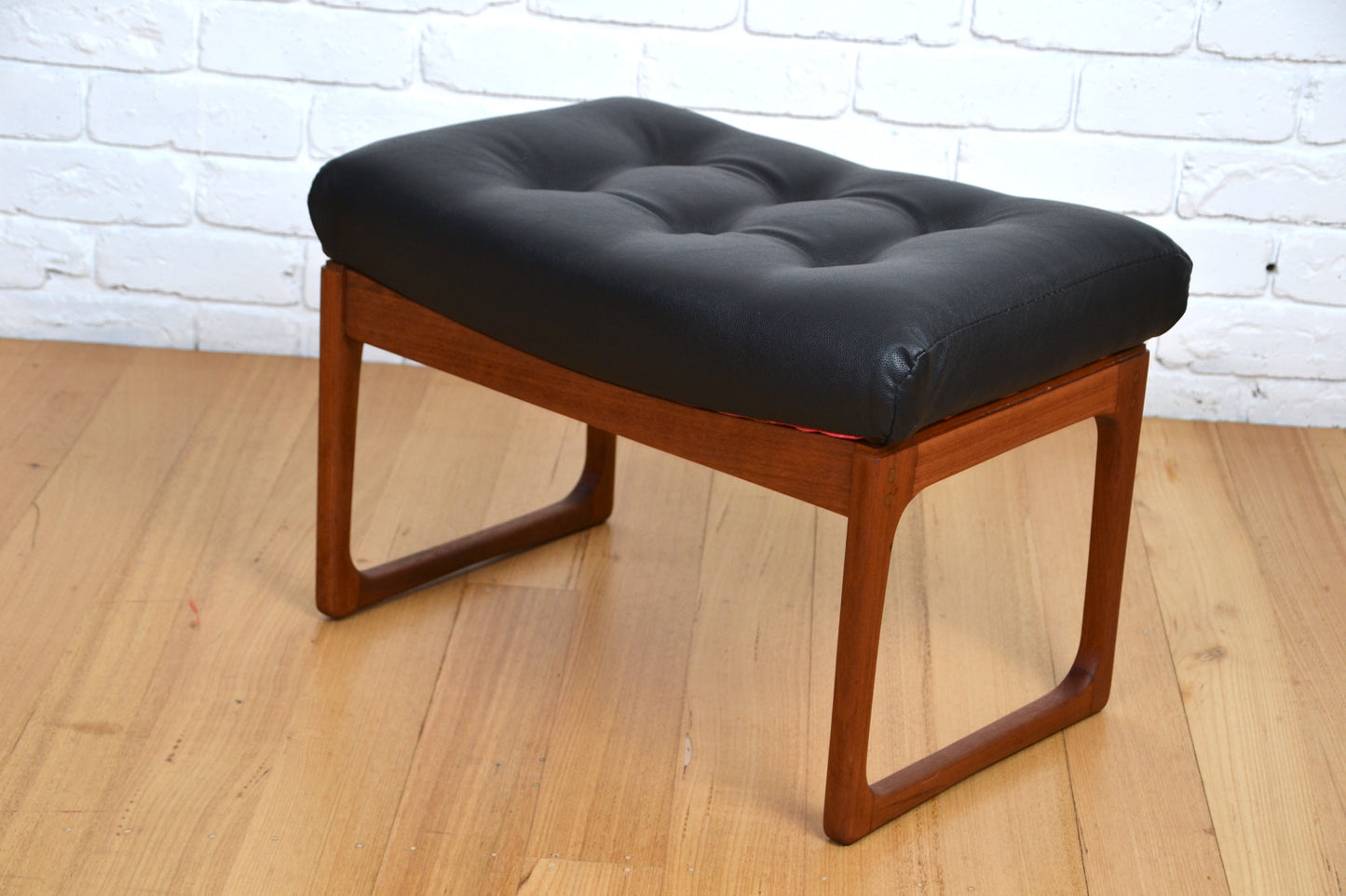 Vintage Gerald Easten sleigh base foot stool