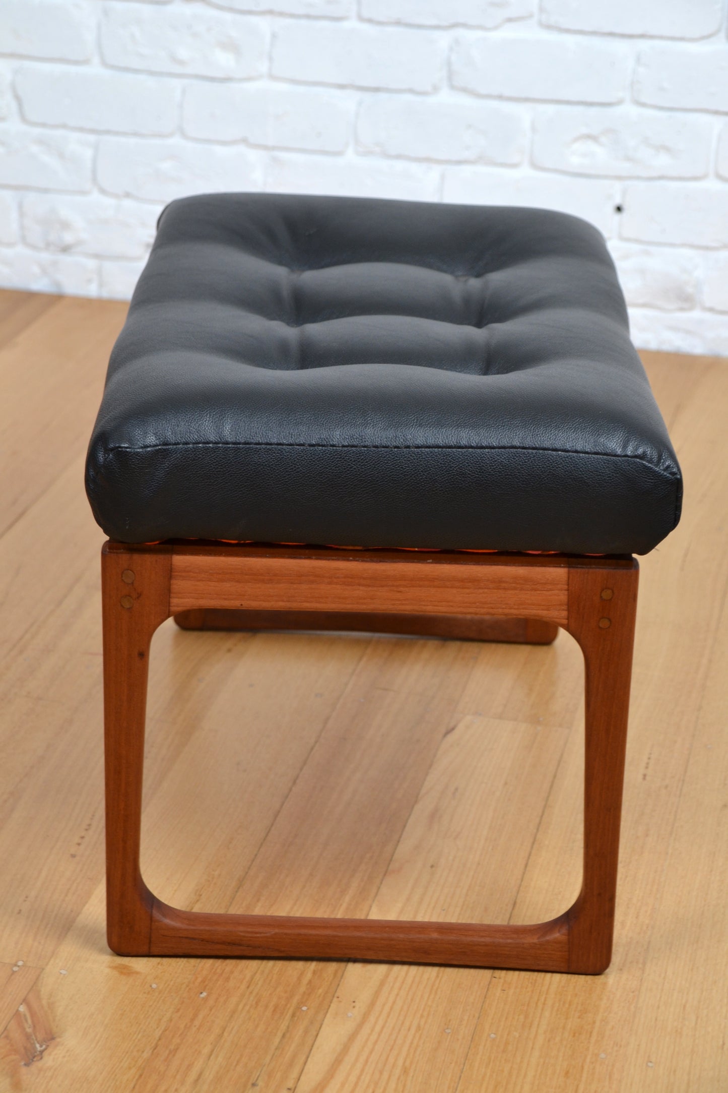 Vintage Gerald Easten sleigh base foot stool