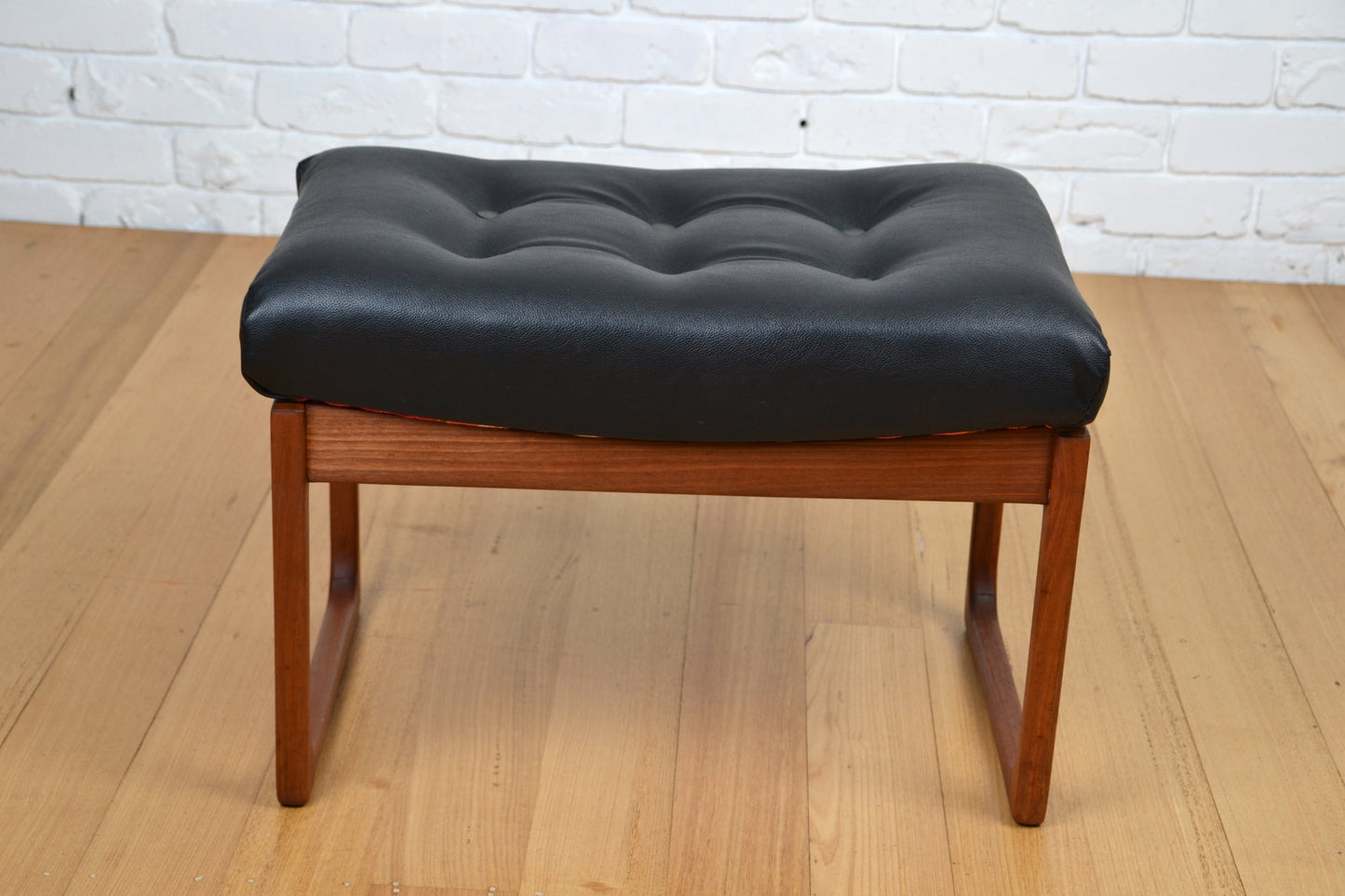 Vintage Gerald Easten sleigh base foot stool