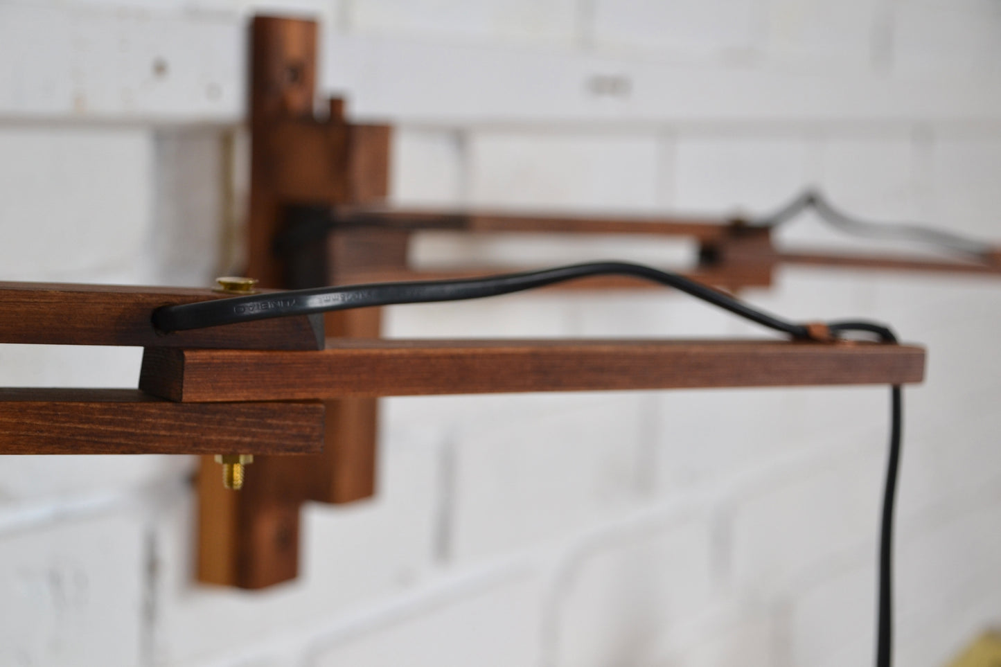 Vintage articulated wall light with brass shade (pair available)