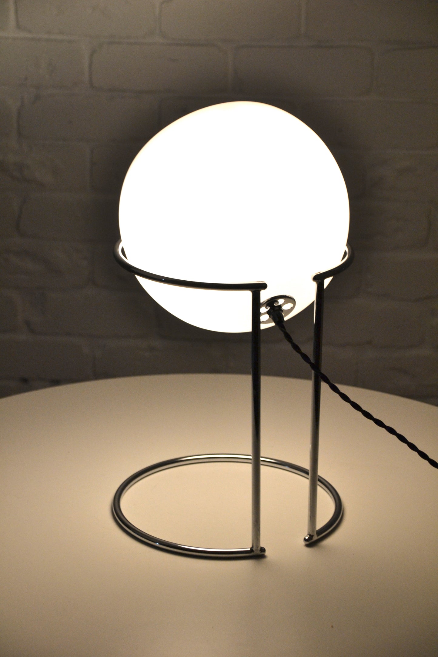 Vintage Italian glass eyeball lamp on chrome plinth
