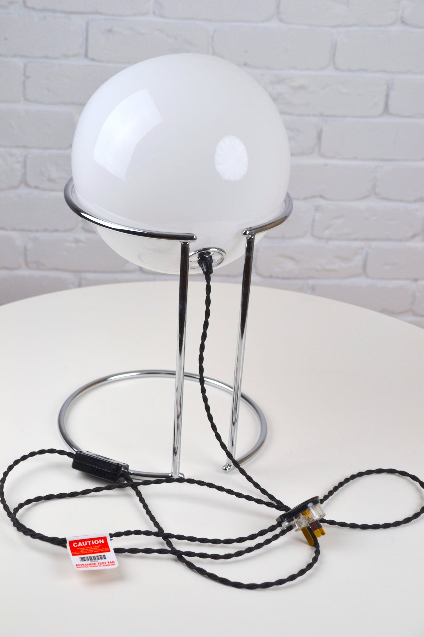 Vintage Italian glass eyeball lamp on chrome plinth