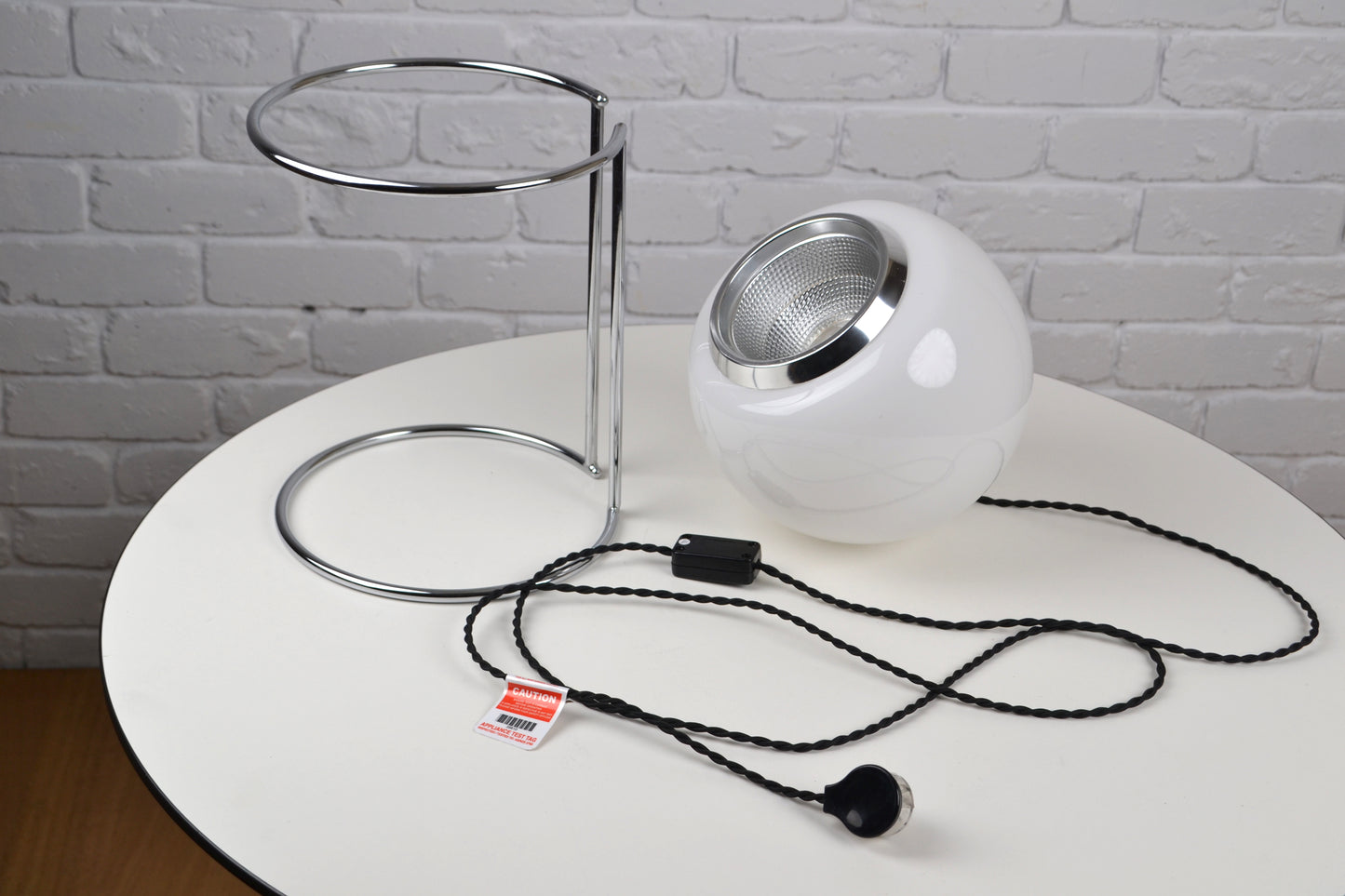 Vintage Italian glass eyeball lamp on chrome plinth